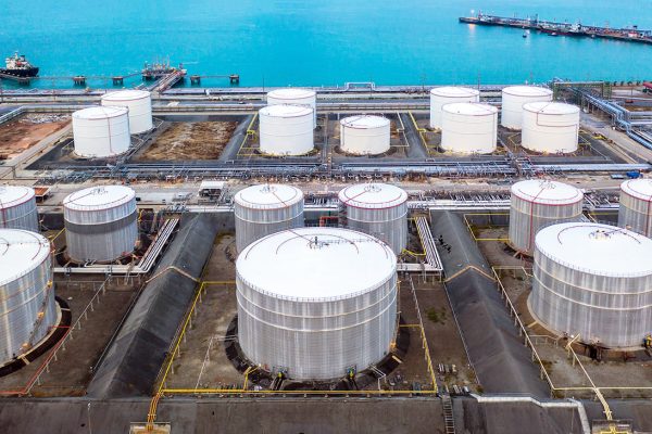 Oil and petrochemical tank, storage of oil and petrochemical products ready for logistic and transport business. Aerial view.